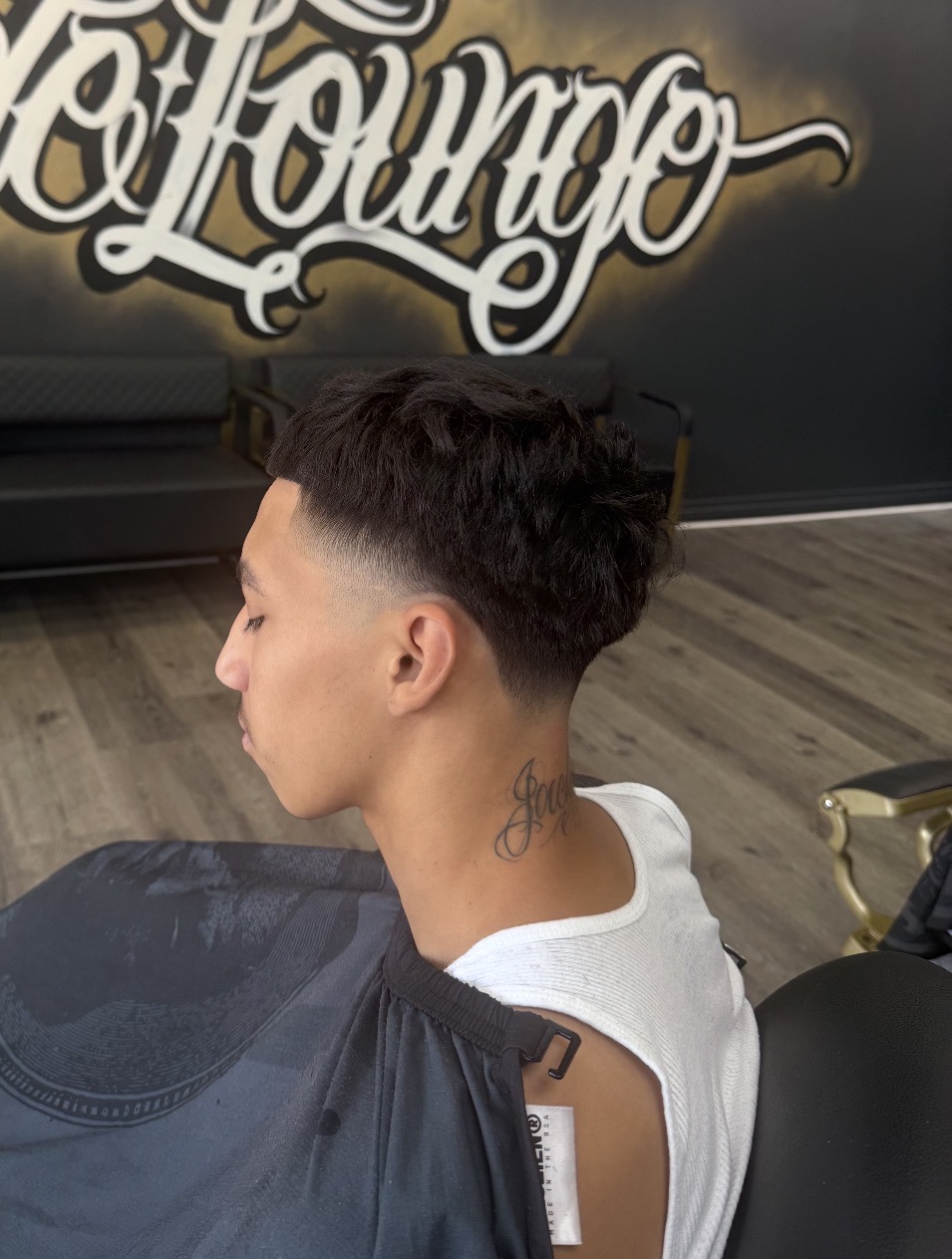 Textured haircut with a smooth fade
