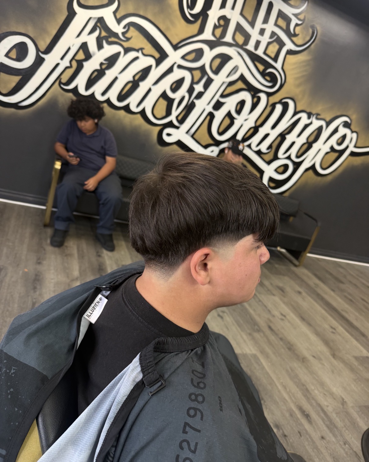 Precision bowl cut with a clean skin fade